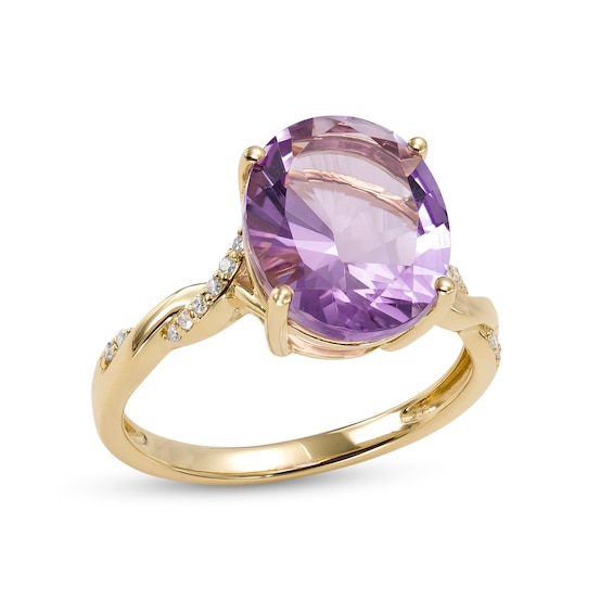 Oval Amethyst and 1/15 CT. T.w. Diamond Twist Shank Ring in 10K Gold â Size 7