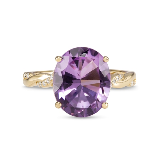 Oval Amethyst and 1/15 CT. T.w. Diamond Twist Shank Ring in 10K Gold â Size 7