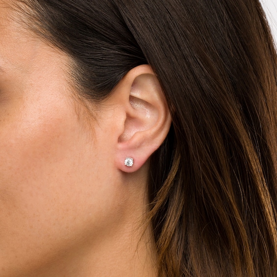 1/2 CT. T.w. Diamond Hidden Accent Solitaire Stud Earrings in 10K White Gold