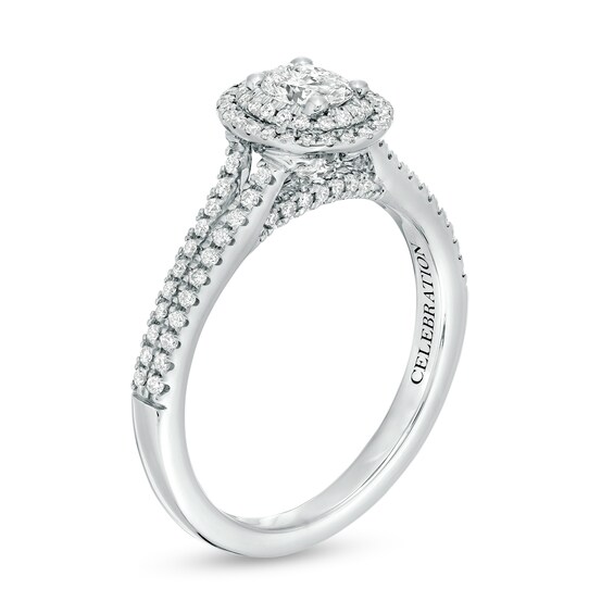 Celebration Infiniteâ¢ 3/4 CT. T.w. Certified Oval Diamond Frame Split Shank Engagement Ring in 14K White Gold (I/Si2)