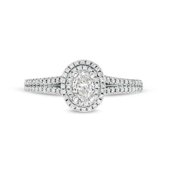 Celebration Infiniteâ¢ 3/4 CT. T.w. Certified Oval Diamond Frame Split Shank Engagement Ring in 14K White Gold (I/Si2)