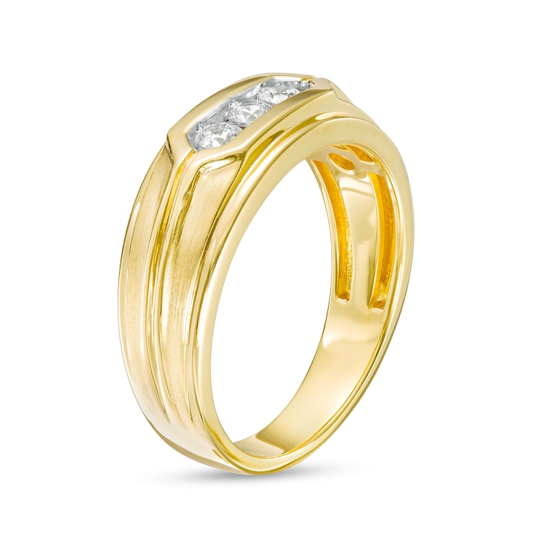Main Image 2 of 1/4 CT. T.W. Diamond Grooved Three Stone Wedding Band in 10K Gold