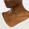 Thumbnail Image 1 of 5.0mm Cushion-Cut Lab-Created Ruby and 1/8 CT. T.W. Diamond Starburst Frame Drop Pendant in 10K Gold