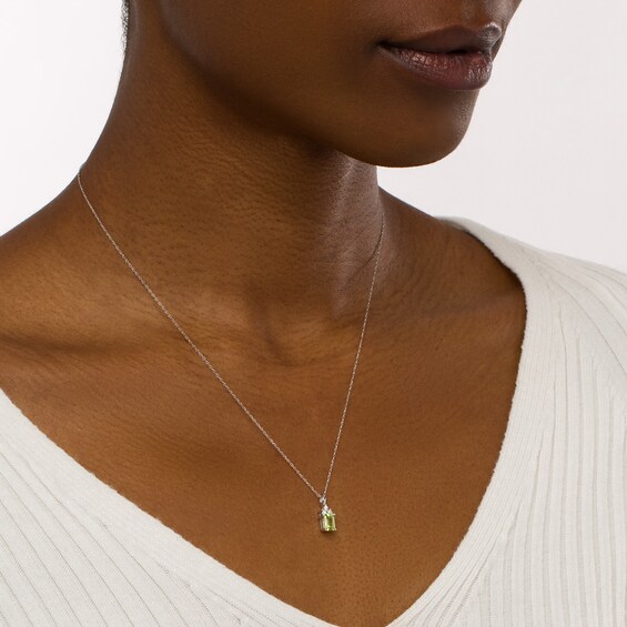 Emerald-Cut Peridot and 1/20 CT. T.w. Diamond Tri-Top Pendant in 10K White Gold