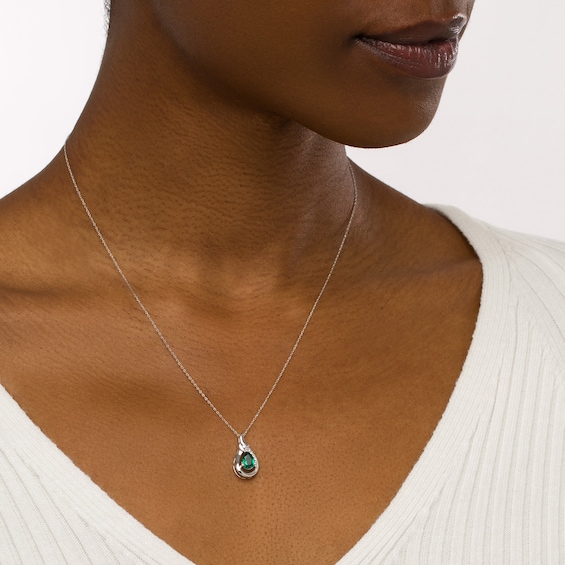Pear-Shaped Lab-Created Emerald and 1/20 CT. T.w. Diamond Open Frame Ribbon Wrapped Teardrop Pendant in 10K White Gold