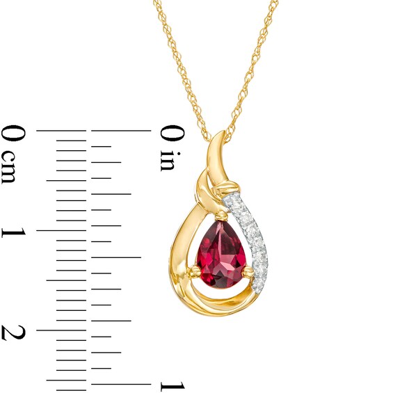Pear-Shaped Garnet and 1/20 CT. T.w. Diamond Open Frame Ribbon Wrapped Teardrop Pendant in 10K Gold
