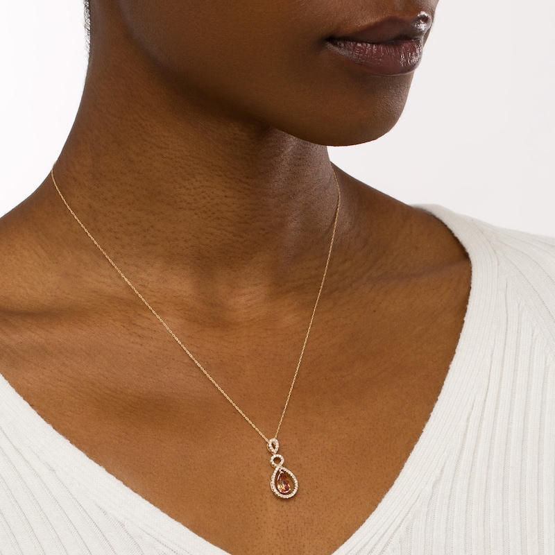 Main Image 2 of Pear-Shaped Yellow Topaz Dangle and 1/4 CT. T.W. Diamond Infinity Drop Pendant in 10K Gold