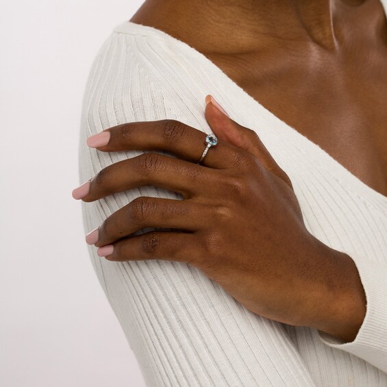 Oval Aquamarine and 1/10 CT. T.w. Diamond Ring in 10K White Gold