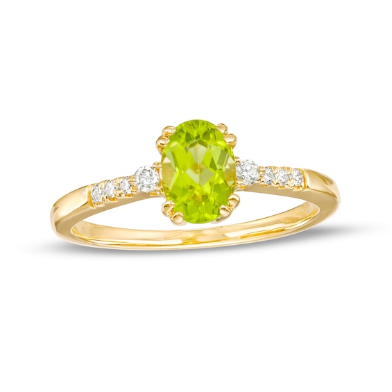 Oval Peridot and 1/10 CT. T.w. Diamond Ring in 10K Gold