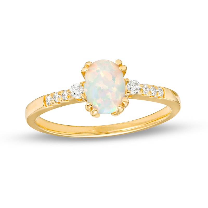 Oval Lab-Created Opal Cabochon and 1/10 CT. T.W. Diamond Ring in 10K Gold