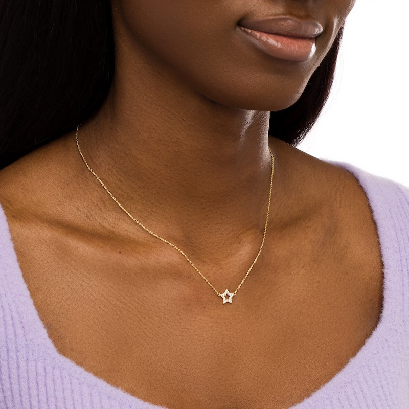 Main Image 2 of 1/10 CT. T.W. Diamond Open Star Necklace in 10K Gold