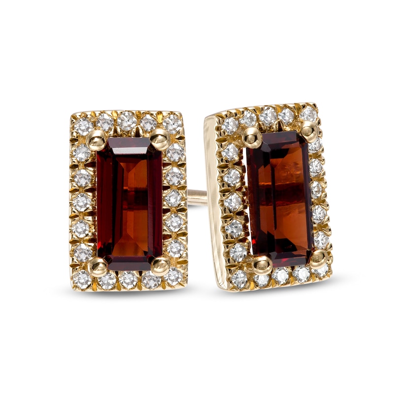 Sideways Baguette Garnet and 1/8 CT. T.W. Diamond Frame Stud Earrings in 10K Gold