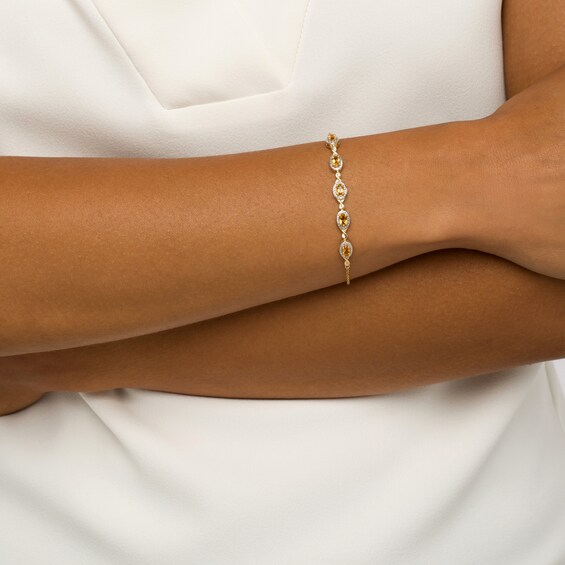 Oval Citrine and Diamond Accent Twist Five Stone Bracelet in 10K Gold â 8.0"