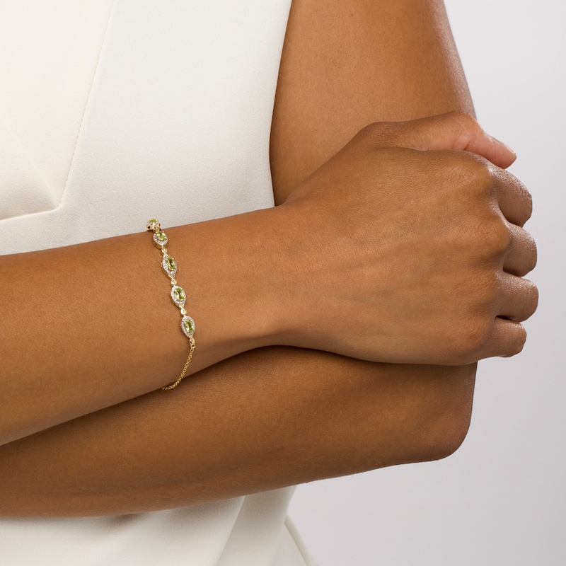 Main Image 2 of Oval Peridot and Diamond Accent Twist Five Stone Bracelet in 10K Gold – 8.0"