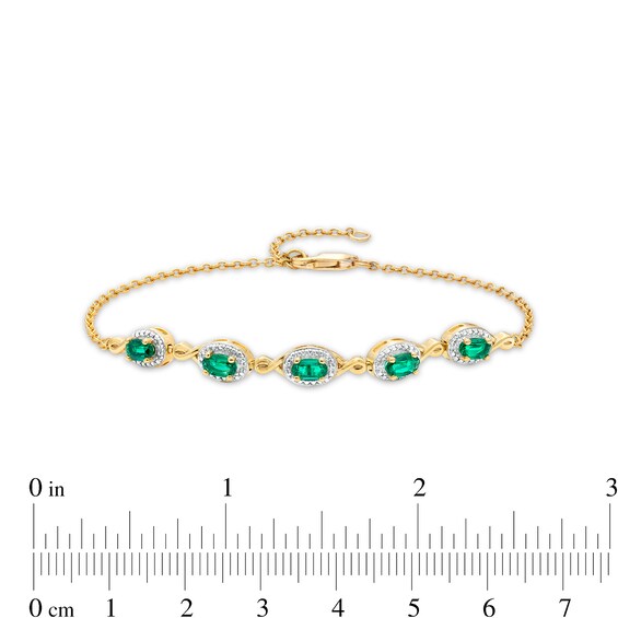 Oval Emerald and Diamond Accent Twist Five Stone Bracelet in 10K Gold â 8.0"