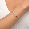 Thumbnail Image 2 of Oval Ruby and Diamond Accent Twist Five Stone Bracelet in 10K Gold – 8.0"