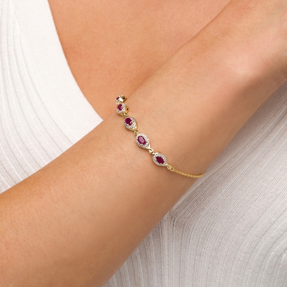 Oval Ruby and Diamond Accent Twist Five Stone Bracelet in 10K Gold â 8.0"
