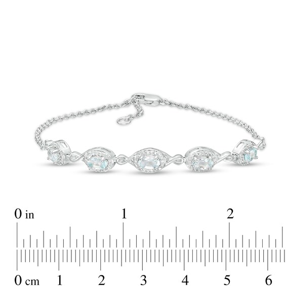 Oval Aquamarine and Diamond Accent Twist Five Stone Bracelet in 10K White Gold â 8.0"