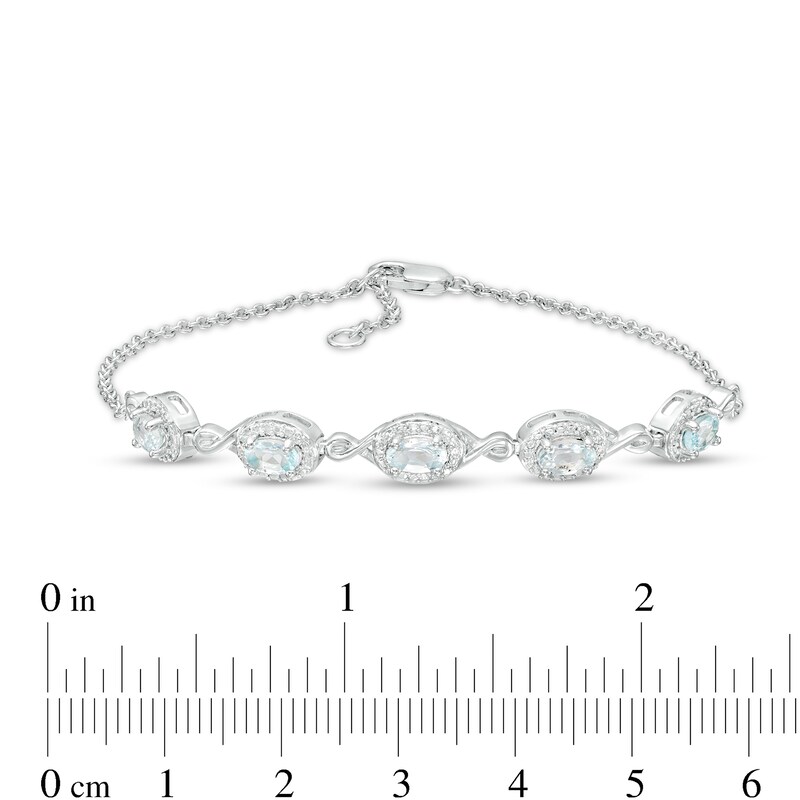 Oval Aquamarine and Diamond Accent Twist Five Stone Bracelet in 10K White Gold – 8.0"