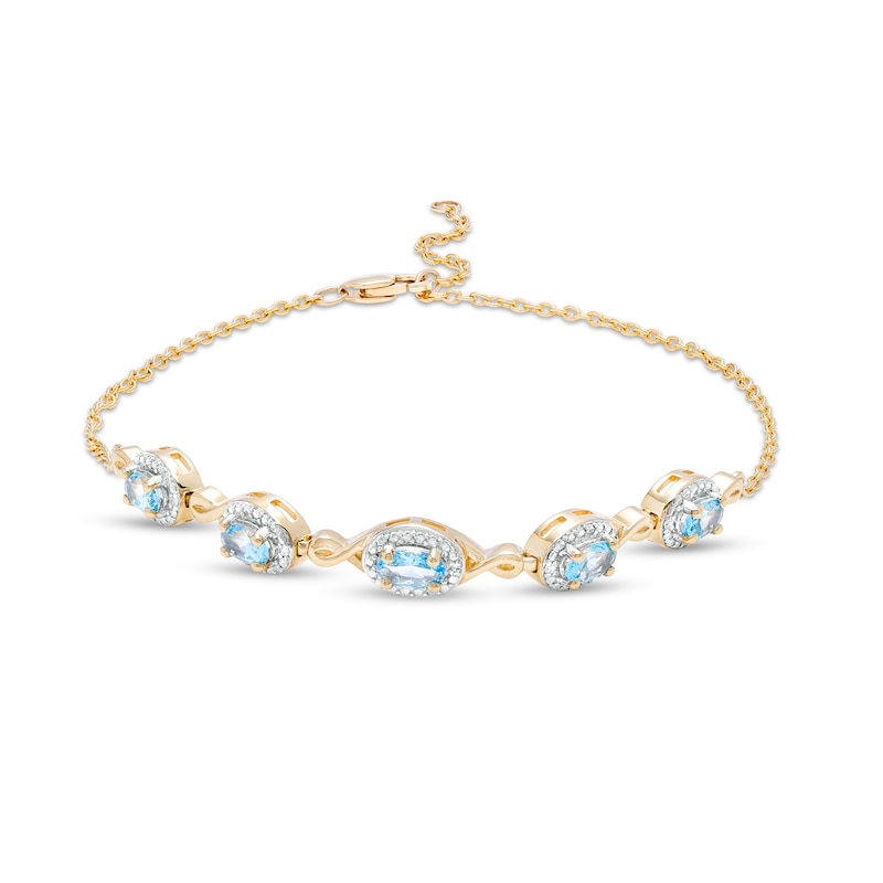 Main Image 1 of Oval Swiss Blue Topaz and Diamond Accent Twist Five Stone Bracelet in 10K Gold – 8.0"
