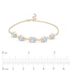 Thumbnail Image 2 of Oval Swiss Blue Topaz and Diamond Accent Twist Five Stone Bracelet in 10K Gold – 8.0"