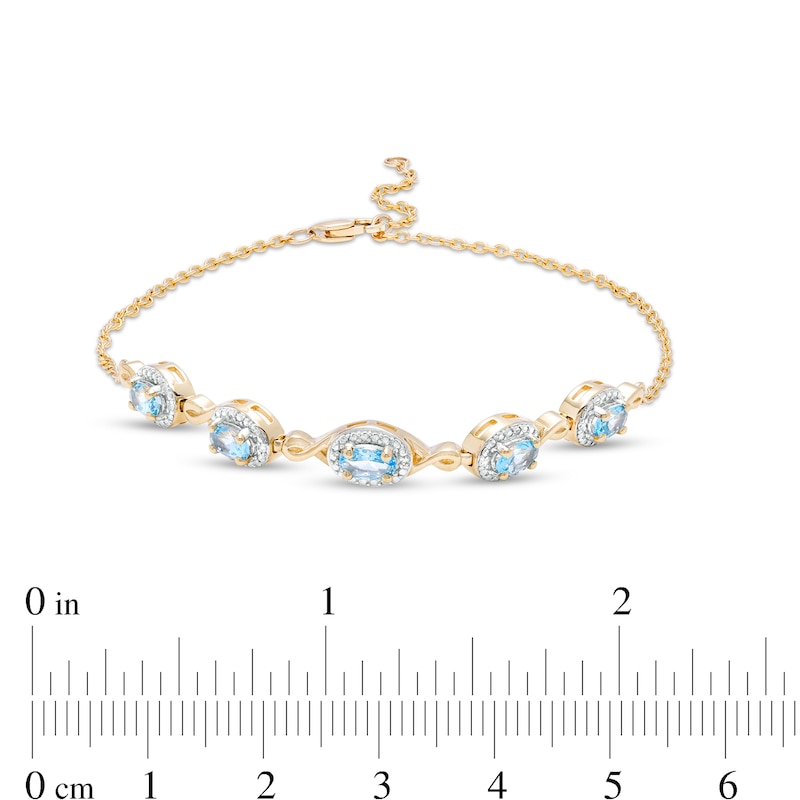 Main Image 3 of Oval Swiss Blue Topaz and Diamond Accent Twist Five Stone Bracelet in 10K Gold – 8.0"