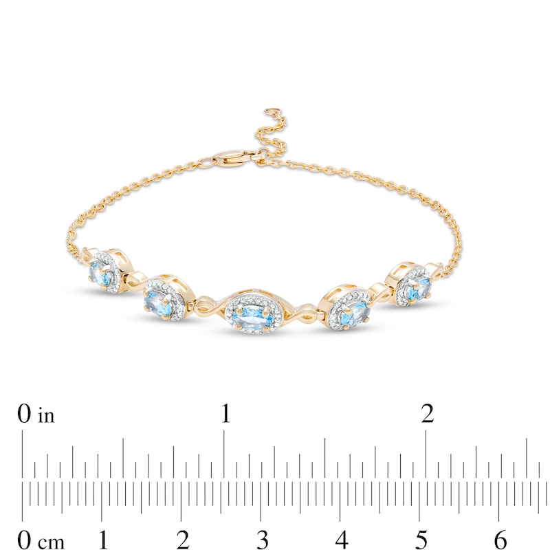 Oval Swiss Blue Topaz and Diamond Accent Twist Five Stone Bracelet in 10K Gold – 8.0"