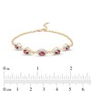 Thumbnail Image 3 of Oval Garnet and Diamond Accent Twist Five Stone Bracelet in 10K Gold – 8.0"