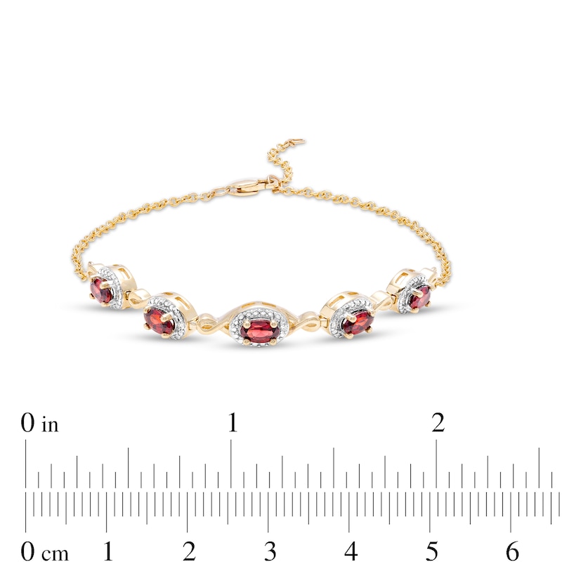 Main Image 3 of Oval Garnet and Diamond Accent Twist Five Stone Bracelet in 10K Gold – 8.0"