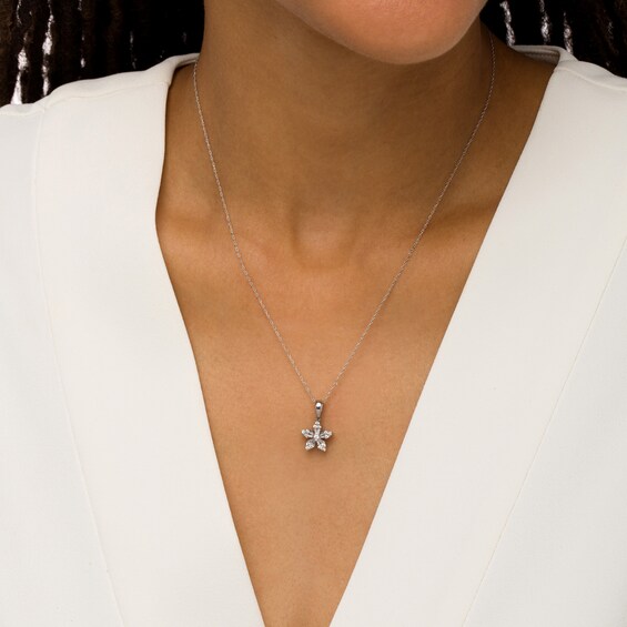 1/4 CT. T.w. Baguette and Round Diamond Flower Pendant in 10K White Gold