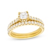 Thumbnail Image 1 of 1 CT. T.W. Princess-Cut Diamond Hidden Frame Bridal Set in 14K Gold (I/I2)