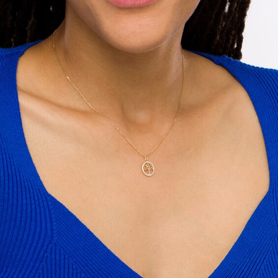 1/10 CT. T.w. Diamond Tree of Life Pendant in 10K Gold