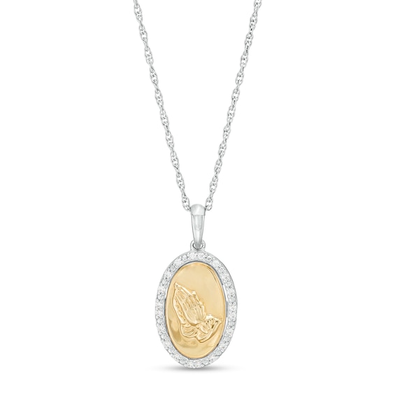 1/10 CT. T.w. Diamond Frame Praying Hands Oval Medallion Pendant in Sterling Silver and 10K Gold