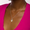 Thumbnail Image 2 of 1/10 CT. T.W. Diamond Frame Praying Hands Oval Medallion Pendant in Sterling Silver and 10K Gold