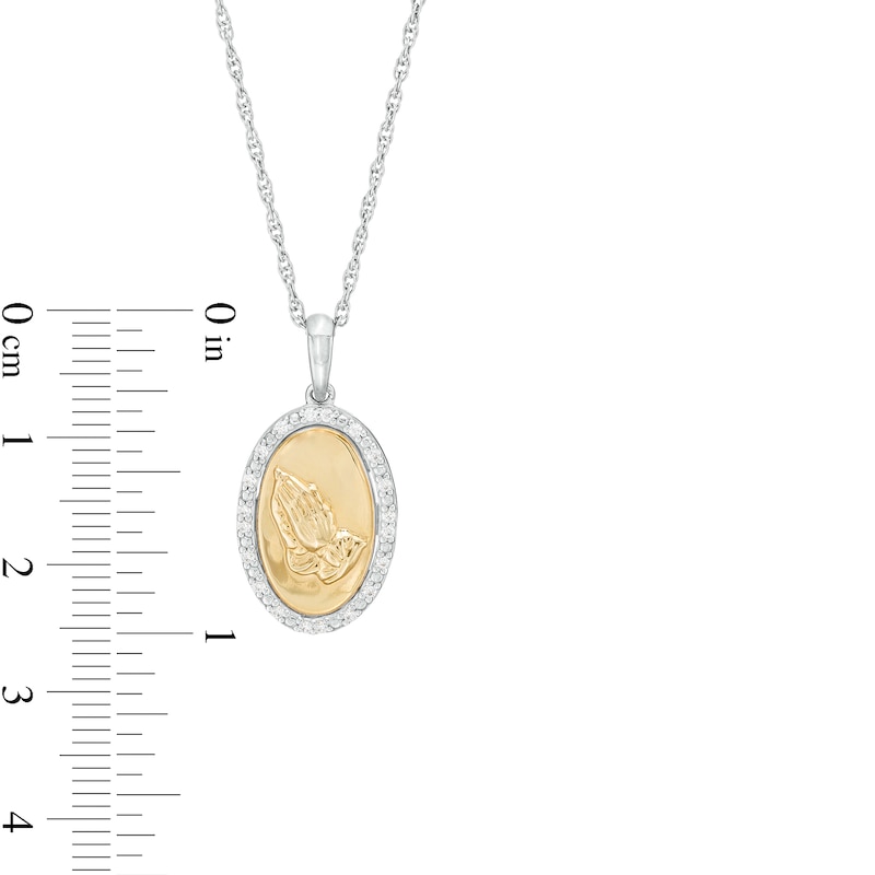 Main Image 4 of 1/10 CT. T.W. Diamond Frame Praying Hands Oval Medallion Pendant in Sterling Silver and 10K Gold