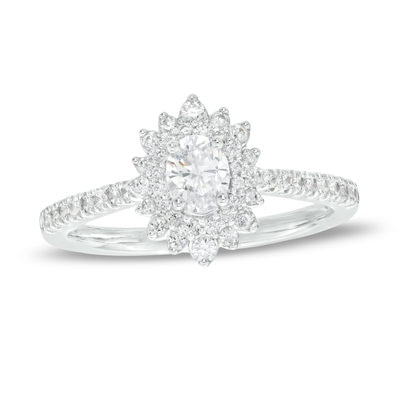 5/8 CT. T.w. Oval Diamond Double Sunburst Frame Engagement Ring in 14K White Gold