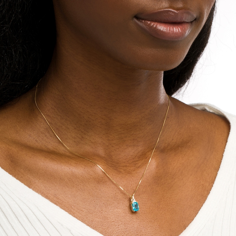 Main Image 2 of Elongated Cushion-Cut London Blue Topaz and 1/20 CT. T.W. Diamond Tri-Top Pendant in 10K Gold