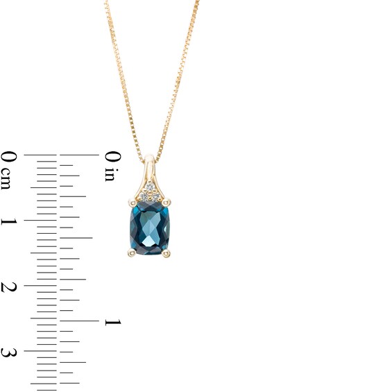 Elongated Cushion-Cut London Blue Topaz and 1/20 CT. T.w. Diamond Tri-Top Pendant in 10K Gold