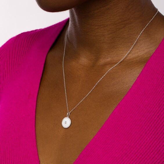 1/5 CT. T.w. Diamond Frame White Enamel Circle Pendant in Sterling Silver