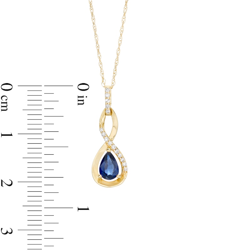 Main Image 3 of Pear-Shaped Blue Sapphire and 1/20 CT. T.W. Diamond Twist Pendant in 10K Gold
