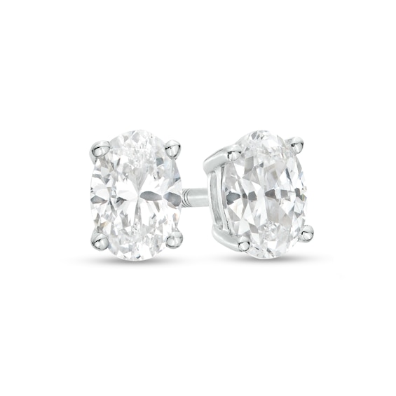 1/2 CT. T.w. Certified Oval Lab-Grown Diamond Solitaire Stud Earrings in 14K White Gold (F/Si2)