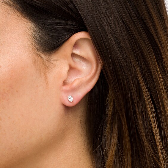 1/2 CT. T.w. Certified Oval Lab-Grown Diamond Solitaire Stud Earrings in 14K White Gold (F/Si2)