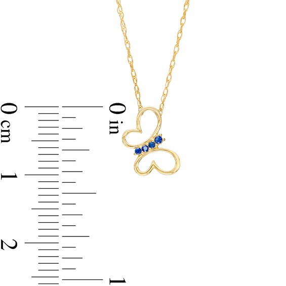 Blue Sapphire Tilted Butterfly Outline Pendant in 10K Gold