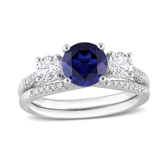 Blue and White Sapphire and 1/10 CT. T.w. Diamond Three Stone Bridal Set in 10K White Gold