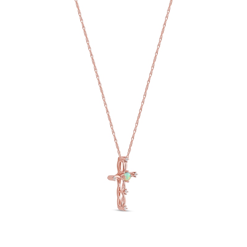 Main Image 2 of Opal and 1/20 CT. T.W. Diamond Braided Cross Pendant in 10K Rose Gold