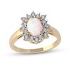 Thumbnail Image 0 of Oval Lab-Created Opal and White Sapphire Shadow Frame Ring in 10K Gold