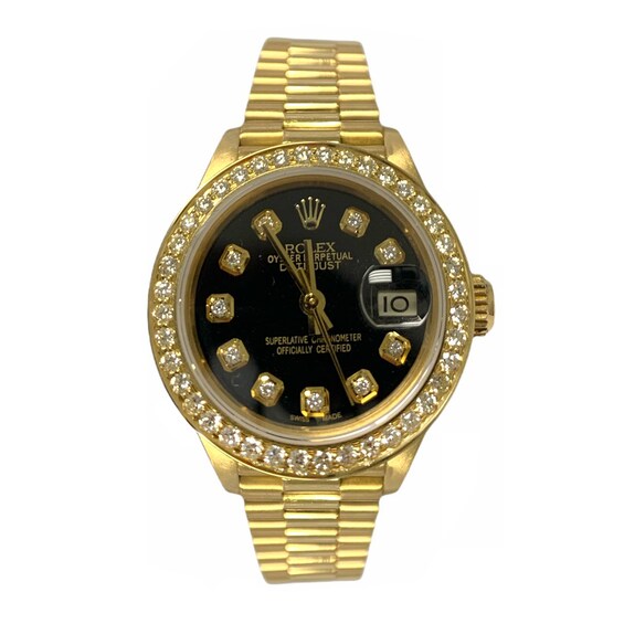 Previously Owned - Ladies' Rolex Datejust 26 1 CT. T.w. Diamond 18K Gold Automatic Watch with Black Dial (Model: 69178)