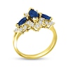 Thumbnail Image 1 of Marquise Blue Sapphire and 5/8 CT. T.W. Diamond Frame Three Stone Ring in 14K Gold