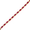Thumbnail Image 1 of Oval Ruby and 1/2 CT. T.W. Diamond Alternating Line Bracelet in 14K Gold