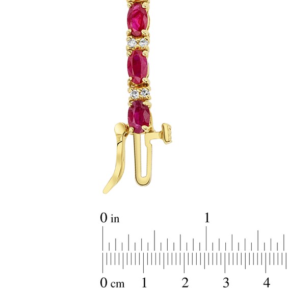 Oval Ruby and 1/2 CT. T.w. Diamond Alternating Line Bracelet in 14K Gold